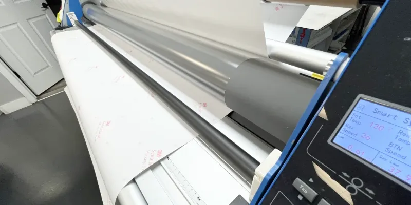 A wide format laminator for finishing services/