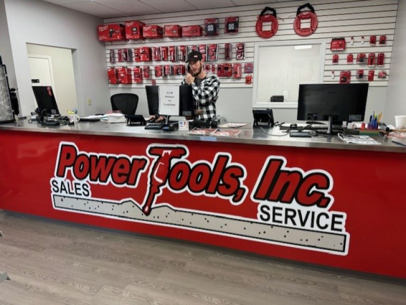 Interior sign for a power tool company desk.